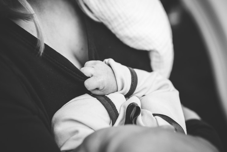 Mother holding a baby