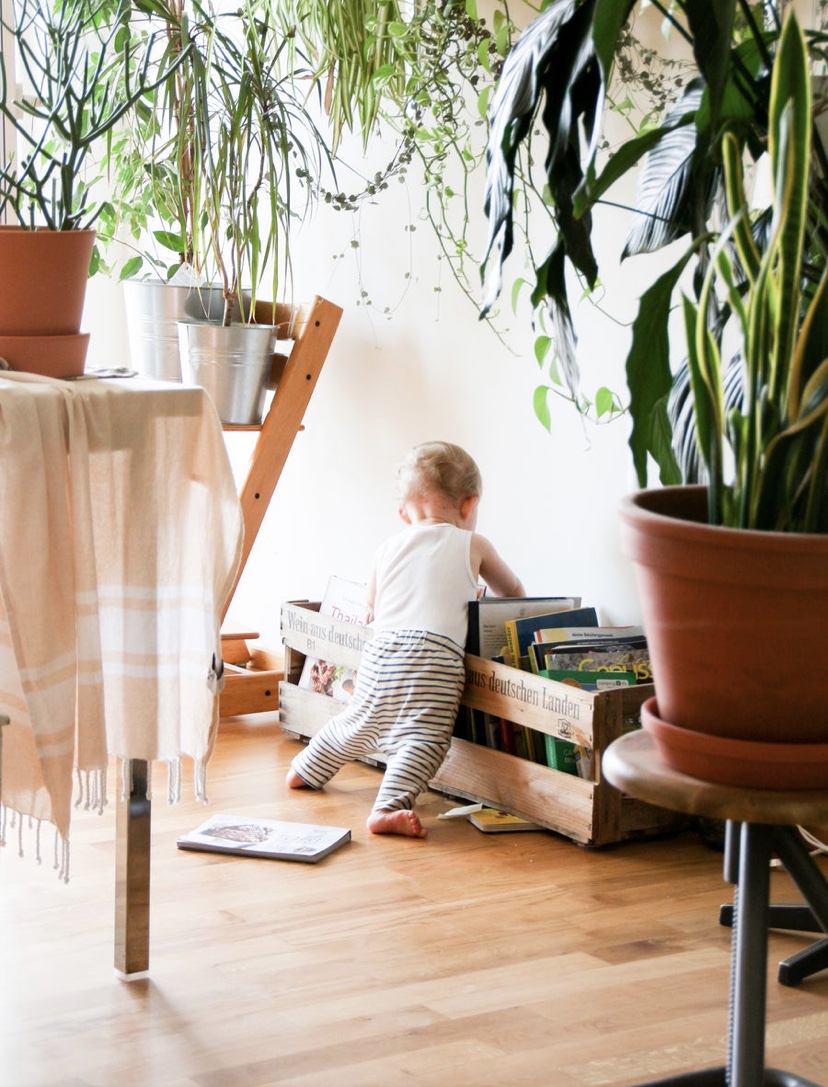 Child playing with books